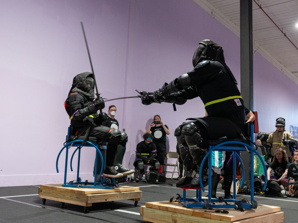 Seated longsword